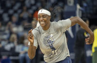 Minnesota Lynx's Sylvia Fowles races off the court after warming up for the team's WNBA basketball game against the Seattle Storm on Friday, Aug. 12, 2022, in Minneapolis. (Elizabeth Flores/Star Tribune via AP)