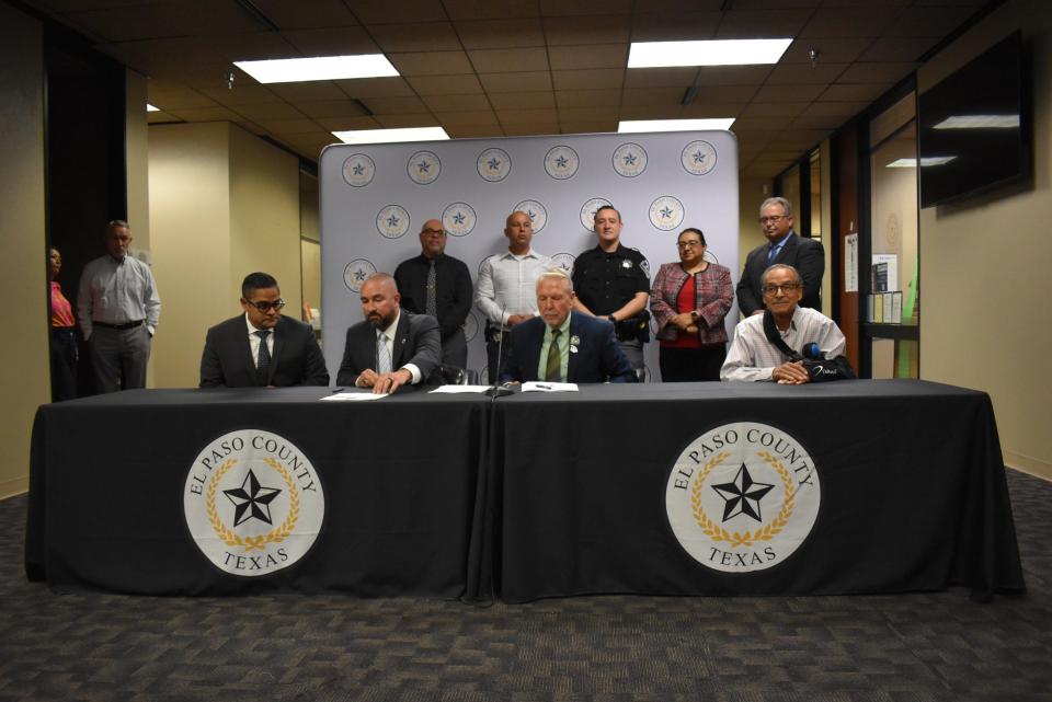 Former El Paso County Sheriff's Officers Association President Pete Faraone (second from left) joins County Judge Ricardo Samaniego and County Commissioner Carlos Leon to sign the latest contract for the El Paso County Sheriff's Office.