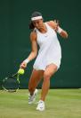 <p>Caroline Garcia of France plays a forehand during the Ladies Singles second round match against Katerina Siniakova of The Czech Republic on day four of the Wimbledon Lawn Tennis Championships at the All England Lawn Tennis and Croquet Club on June 30, 2016 in London, England. (Photo by Clive Brunskill/Getty Images)</p>