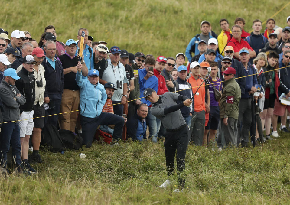 Jordan Spieth of the United States plays out of the rough on the 10th fairway during the second round of the British Open Golf Championships at Royal Portrush in Northern Ireland, Friday, July 19, 2019.(AP Photo/Jon Super)