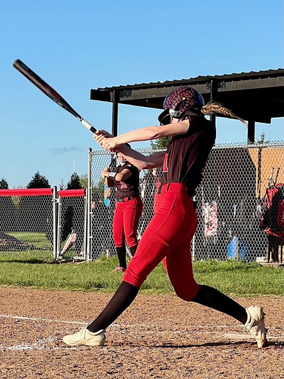 Pleasant's Hannah Miller swings at a pitch during a softball game at Marion Harding this season.
