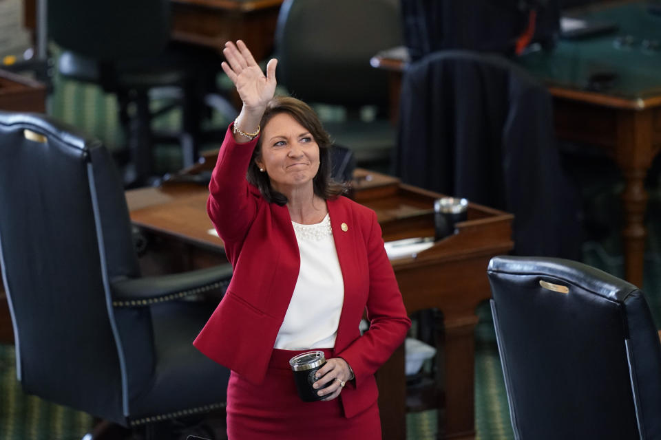 State Sen. Angela Paxton, R-McKinney waves to the gallery as she arrives for the impeachment trial for Texas Attorney General Ken Paxton, her husband, in the Senate Chamber at the Texas Capitol, Tuesday, Sept. 5, 2023, in Austin, Texas. (AP Photo/Eric Gay)