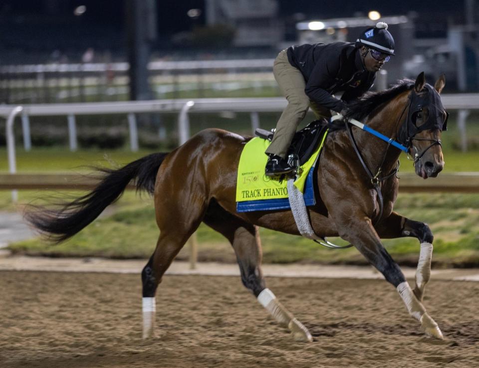 Kentucky Derby hopeful Track Phantom gallops on the track during a morning workout at Churchill Downs. Special to the Courier Journal by Pat McDonogh. April 25, 2024
