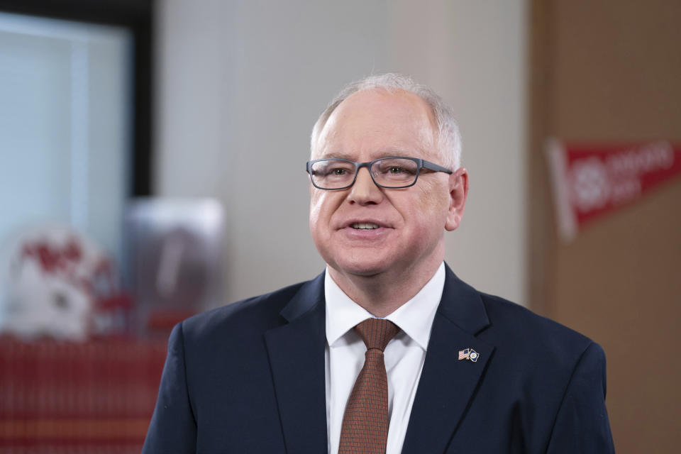 FILE - In this March 28, 2021, file photo, Minnesota Gov. Tim Walz delivers his third State of the State address in Mankato, Minn. Walz called on lawmakers Tuesday, Oct. 5, 2021, to approve a series of new measures to respond to the fourth wave of the COVID-19 pandemic, including vaccine and testing requirements for teachers and school staff, and for long-term care workers. (Glen Stubbe/Star Tribune via AP, Pool, file)