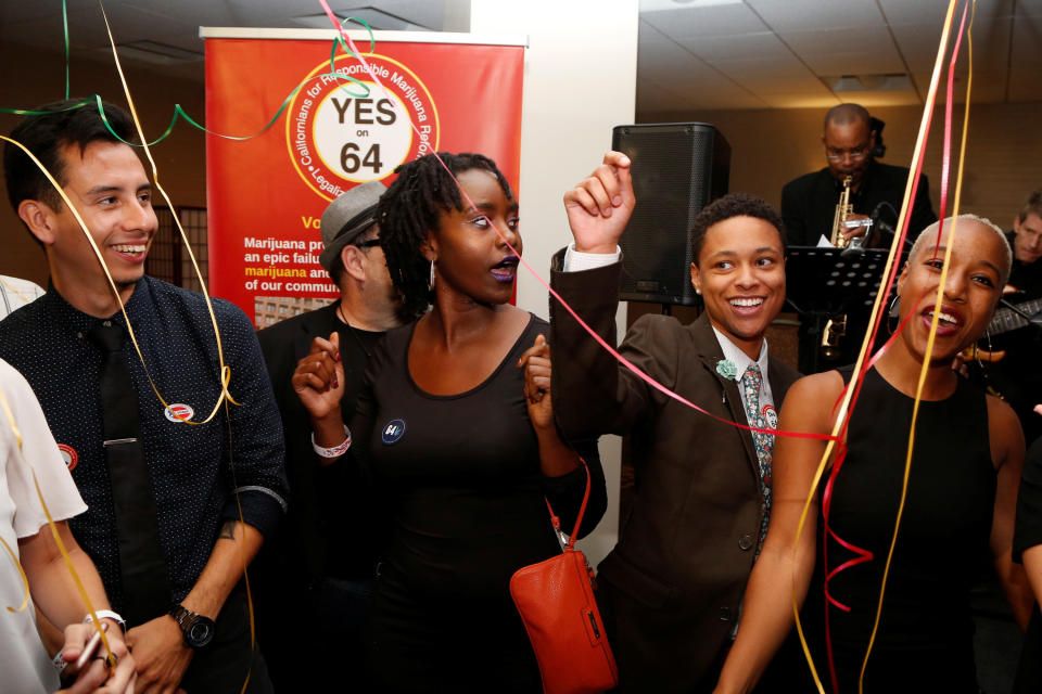 People celebrate after Californians voted to pass Prop 64, legalizing recreational use of marijuana in the state. (Photo: Jonathan Alcorn / Reuters)