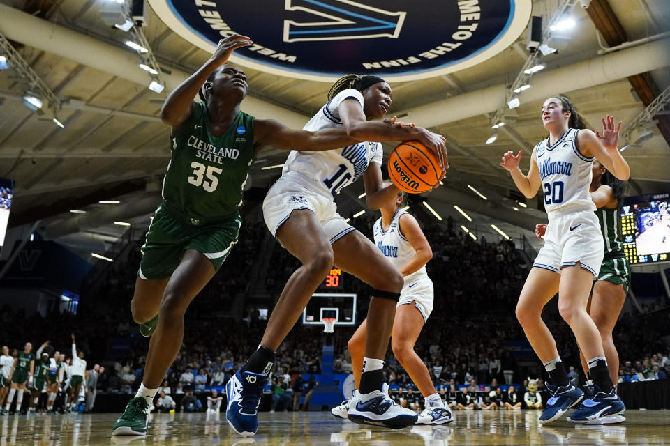 Villanova's Christina Dalce and Cleveland State's Amele Ngwafang battle for the ball during the first half of a first-round college basketball game in the NCAA Tournament, Saturday, March 18, 2023, in Villanova, Pa. (AP Photo/Matt Rourke)