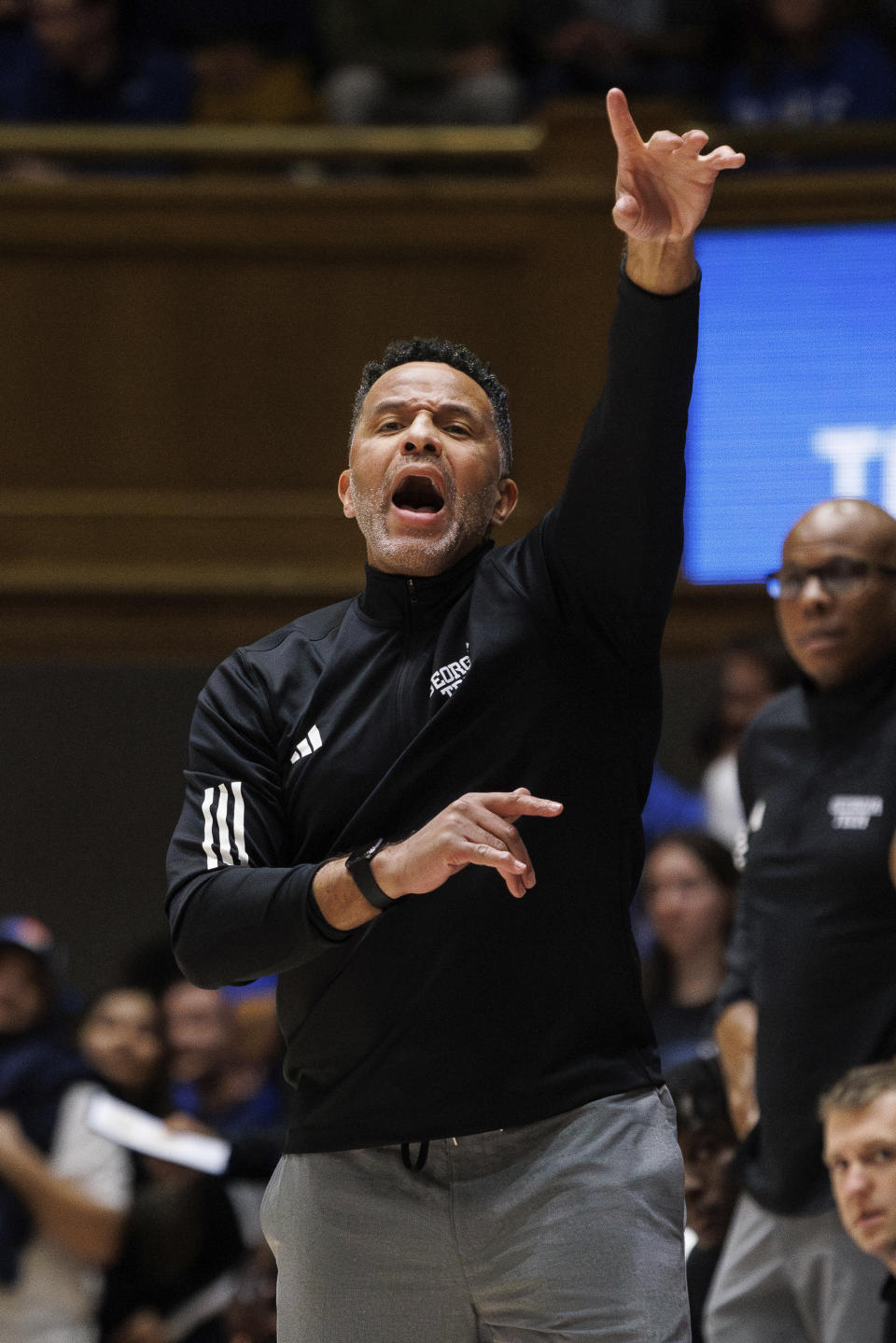 Georgia Tech head coach Damon Stoudamire directs his team during the first half of an NCAA college basketball game against Duke in Durham, N.C., Saturday, Jan. 13, 2024. (AP Photo/Ben McKeown)