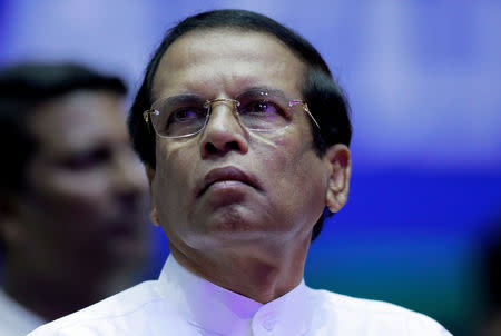 FILE PHOTO: Sri Lanka's President Maithripala Sirisena looks on during a special party convention in Colombo, Sri Lanka December 4, 2018. REUTERS/Dinuka Liyanawatte/File Photo