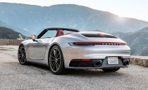 <p>Open the rear engine cover of any 2020 <a href="https://www.caranddriver.com/porsche/911" rel="nofollow noopener" target="_blank" data-ylk="slk:Porsche 911;elm:context_link;itc:0;sec:content-canvas" class="link ">Porsche 911</a>, and you'll see fans. Pretty anticlimactic. However, underneath those cooling blades sits the 443-hp 3.0-liter twin-turbo flat-six. Its two turbos connect to the cylinder banks via symmetrical plumbing to streamline performance and reduce lag, using every trick in the book to maximize the compact flat-six's potential. The droptop 911 Carrera S <a href="https://www.caranddriver.com/reviews/a30502259/2020-porsche-911-carrera-s-review/" rel="nofollow noopener" target="_blank" data-ylk="slk:gives up nothing to the hardtop;elm:context_link;itc:0;sec:content-canvas" class="link ">gives up nothing to the hardtop</a>, matching its sprint to 60 mph in just 2.9 seconds and conquering the quarter-mile in 11.2 at 125 mph. Just be prepared to shell out an additional $12,900 for a follicle-straining breeze.</p>