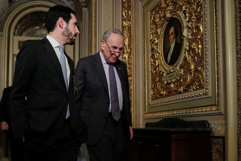 U.S. Senate Minority Leader Chuck Schumer returns to the chamber during a break from the Trump impeachment trial in Washington