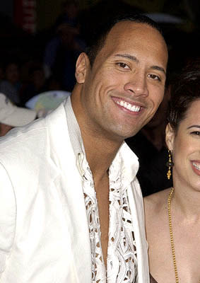 The millions and millions of The Rock 's fans are glad to see him at the LA premiere of Universal's The Scorpion King