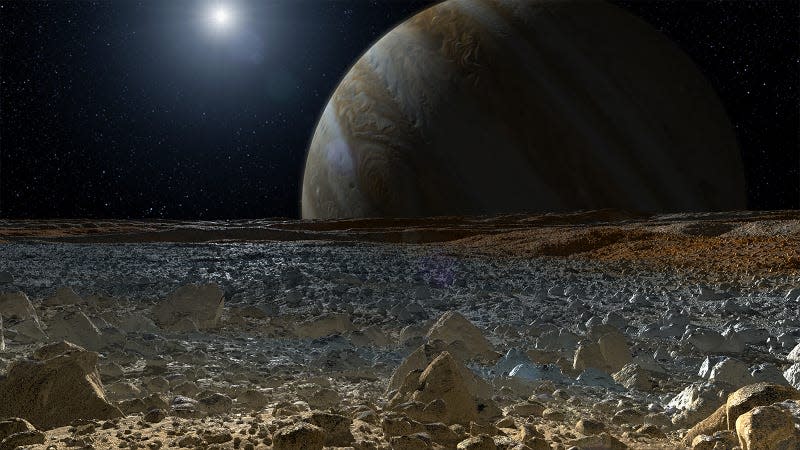 Artist’s depiction of the jagged, icy surface on Europa, with Jupiter in the background. 