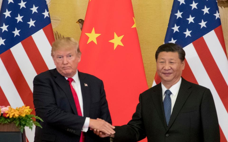 The trade war between the US and China could be a trigger for a sharp fall in stock prices and for reduced global economic growth, the IMF fears - AP