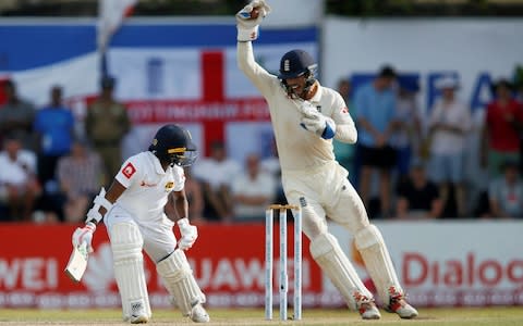 England's wicketkeeper Ben Foakes celebrates after taking a catch to dismiss Sri Lanka's Akila Dananjaya - Credit: &nbsp;REUTERS/Dinuka Liyanawatte