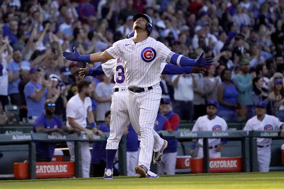 Chicago Cubs' Willson Contreras celebrates his grand slam off Pittsburgh Pirates relief pitcher Bryse Wilson during the first inning of a baseball game Monday, May 16, 2022, in Chicago. (AP Photo/Charles Rex Arbogast)