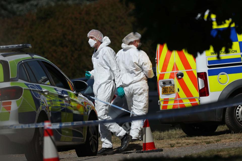 Forensic teams continue to work at the scene (PA)
