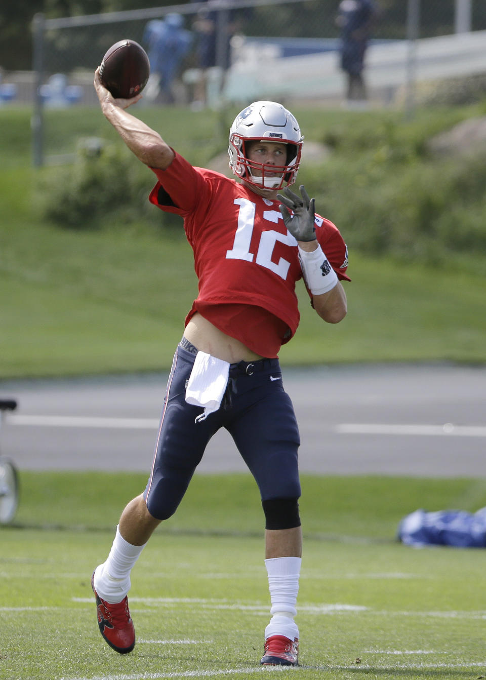 New England Patriots quarterback Tom Brady throws the ball during an NFL football practice, Wednesday, Sept. 5, 2018, in Foxborough, Mass. (AP Photo/Steven Senne)