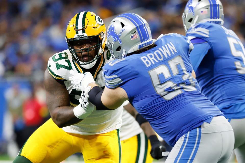 Detroit Lions center Evan Brown (63) blocks Green Bay Packers defensive tackle Kenny Clark (97) in the second half during an NFL football game, Sunday, Nov. 6, 2022, in Detroit. (AP Photo/Rick Osentoski) ORG XMIT: NYOTK