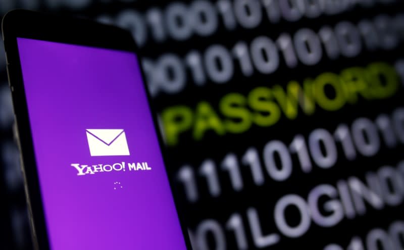 Yahoo Mail logo is displayed on a smartphone's screen in front of a code in this illustration taken in October 6, 2016. REUTERS/Dado Ruvic
