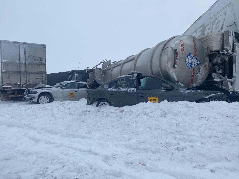 Two Iowa State Patrol vehicles were damaged in a pileup near Newton that involved roughly 40 vehicles Thursday, Feb. 4, 2021. Neither trooper was injured.