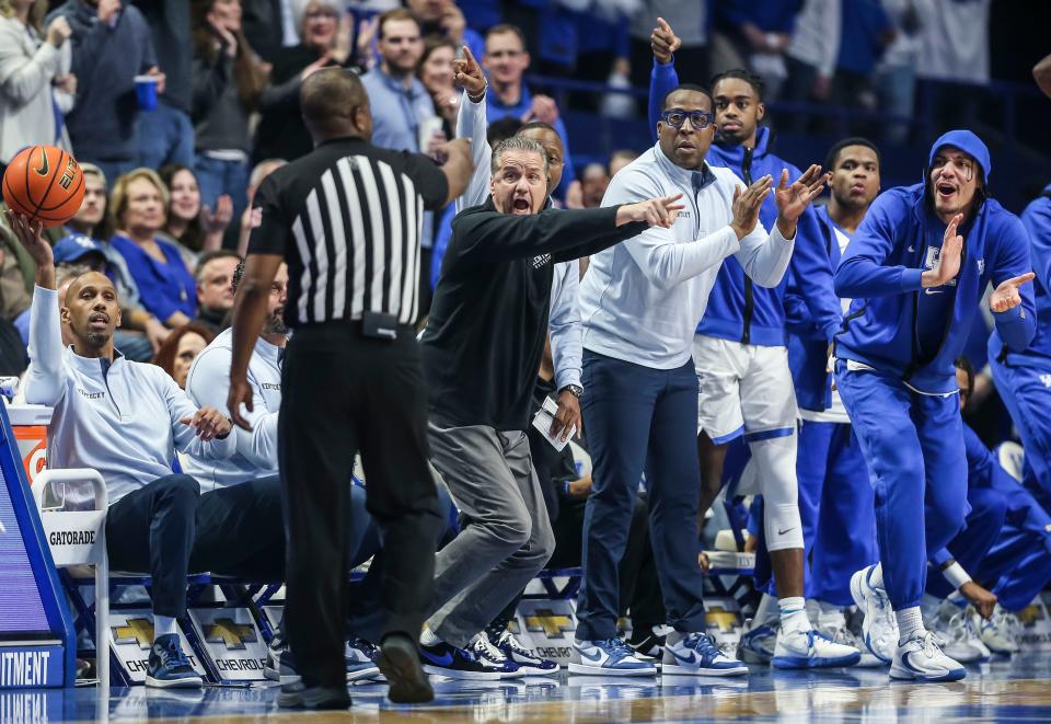 Kentucky head coach John Calipari gestures to a referee about a possession call during the game against Kansas at Rupp Arena. Jan. 28, 2023