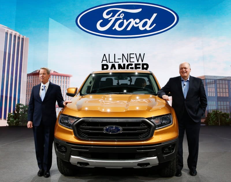 Bill Ford, executive chairman of the Ford Motor Company and Jim Hackett (R), President and CEO, present the 2019 Ford Ranger during the Ford press preview at the North American International Auto Show in Detroit,