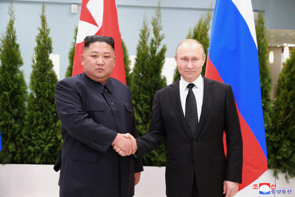 In this Thursday, April 25, 2019, photo provided by the North Korean government, North Korean leader Kim Jong Un, left, shakes hands with Russian President Vladimir Putin in Vladivostok, Russia. The content of this image is as provided and cannot be independently verified. Korean language watermark on image as provided by source reads: "KCNA" which is the abbreviation for Korean Central News Agency. (Korean Central News Agency/Korea News Service via AP)