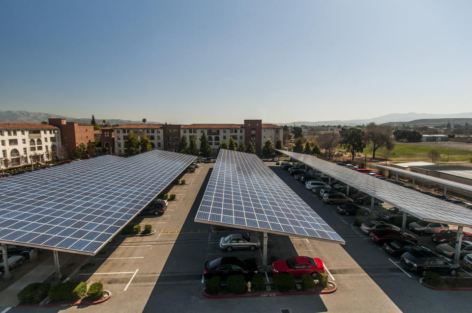 Solar panels provide energy and shade for this California parking lot.