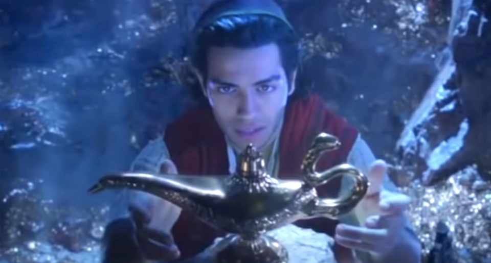 Aladdin looking at the lamp