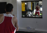 A member of the Afghan national boxing team trains during a session in local gym in Serbia, Wednesday, Dec. 1, 2021. They practiced in secrecy and sneaked out of Afghanistan to be able to compete at an international championship. Now, the Afghan boxing team are seeking refuge in the West to be able to continue both their careers and lives without danger or fear. (AP Photo/Darko Vojinovic)
