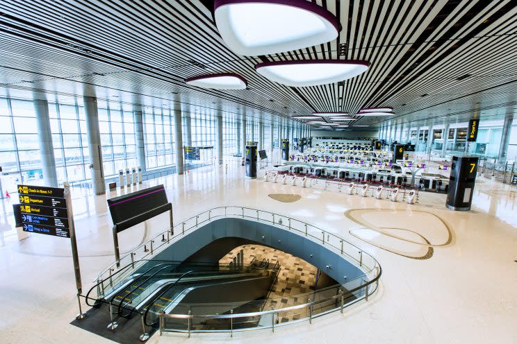 Changi Airport Terminal 4 boasts end-to-end Fast and Seamless Travel (FAST) with 65 automated check-in kiosks and 50 automated bag drop machines equipped with Facial Recognition System. (Photo: Changi Airport Group)