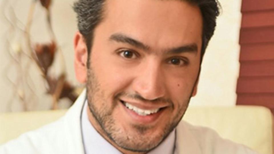 Dr. Hassan Galadari in a white coat