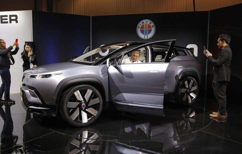 The Fisker Ocean electric SUV is on display at the Fisker booth during the CES tech show, Tuesday, Jan. 7, 2020, in Las Vegas. (AP Photo/John Locher)