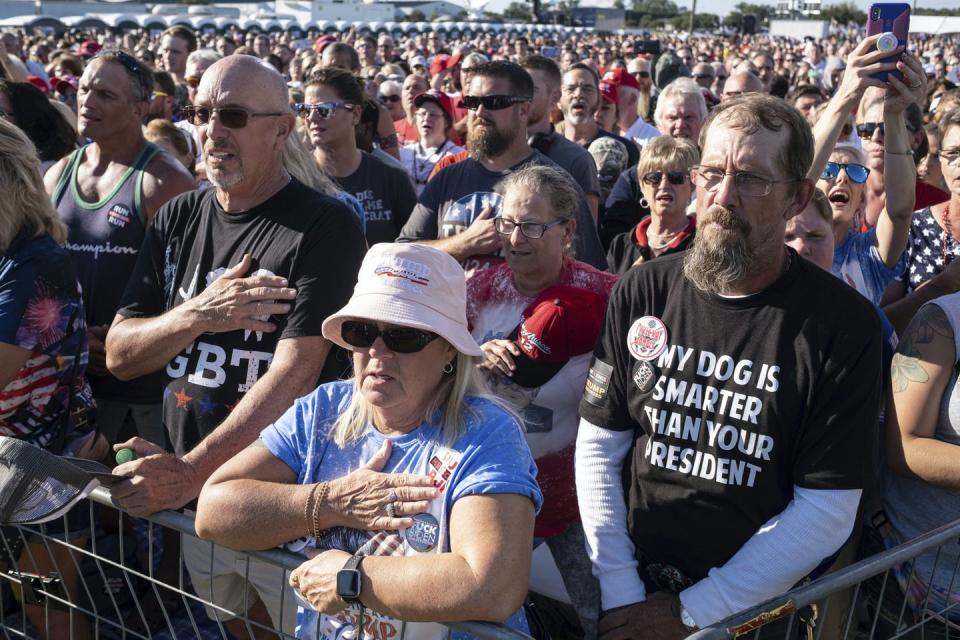 <span class="caption">Supporters sing the national anthem while attending former president Donald Trump’s Save America rally in Georgia on in Sept. 2021.</span> <span class="attribution"><span class="source">(AP Photo/Ben Gray)</span></span>