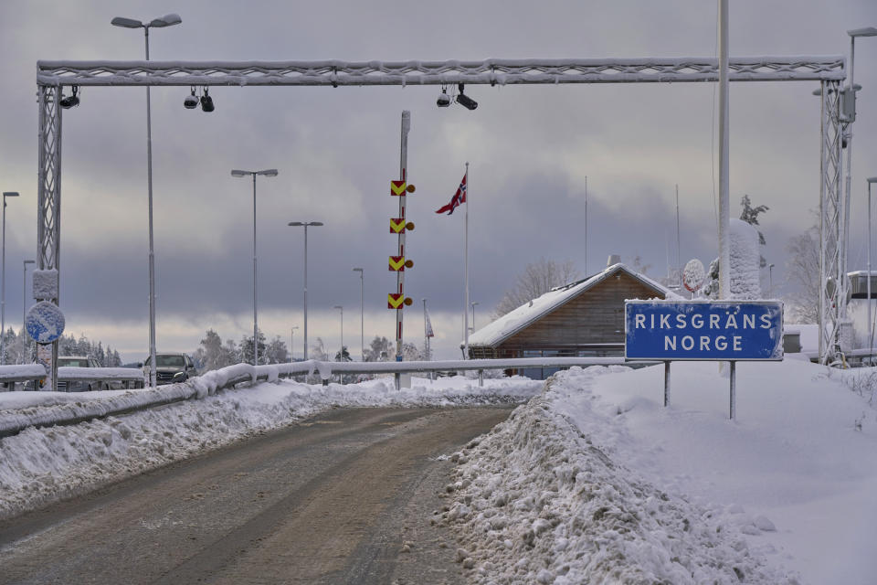 In this photo taken on Friday, Feb. 8 2019, a sign at the entrance of the border post informs travellers that they are entering Norway. Norway's hard border with the European Union is equipped with cameras, license-plate recognition systems and barriers directing traffic to Customs officers. Norway's membership in the European Economic Area (EEA) grants it access to the common market and most goods are exempt from paying duties but everything entering the country must be declared and cleared through customs. (AP Photo/David Keyton)