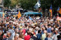 People demonstrate following the arrest of former Catalan government head Puigdemont