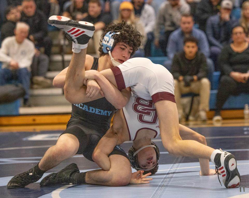 CBA's Paul Kenny (left) is favored to win the Region 7 113-pound title.