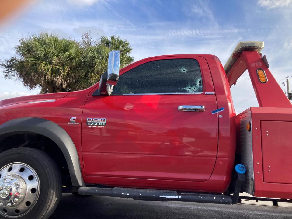 A man was shot in the 2000 block of Southwest Villanova Road in Port St. Lucie on Jan. 25, 2024, during the attempted repossession of a vehicle, according to the Port St. Lucie Police Department. The tow truck, with bullet holes in its window, is hauled away from the residence.