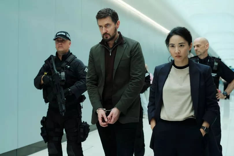 Promotional photo of Richard Armitage and Jing Lusi in Red Eye