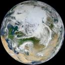 A NASA image from June 2012 shows the Earth taken from an angle over the Arctic. Arctic ice is considered vital for the planet as it reflects heat from the sun back into space, helping keep down the planet's temperatures