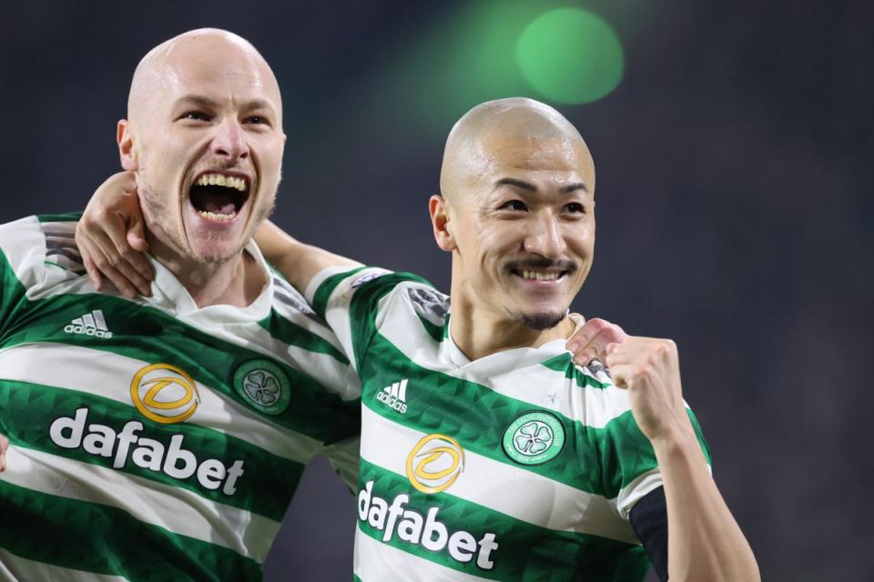 Celtic’s Daizen Maeda (right) celebrates with Aaron Mooy after opening the scoring against St Mirren (Steve Welsh/PA) (PA Wire)