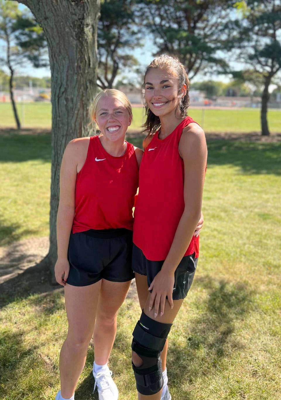 Shelby juniors Annie Mahek (left) and Bella Carver (right) secured a state tennis tournament berth on Wednesday as a double team at the Division II district tournament.