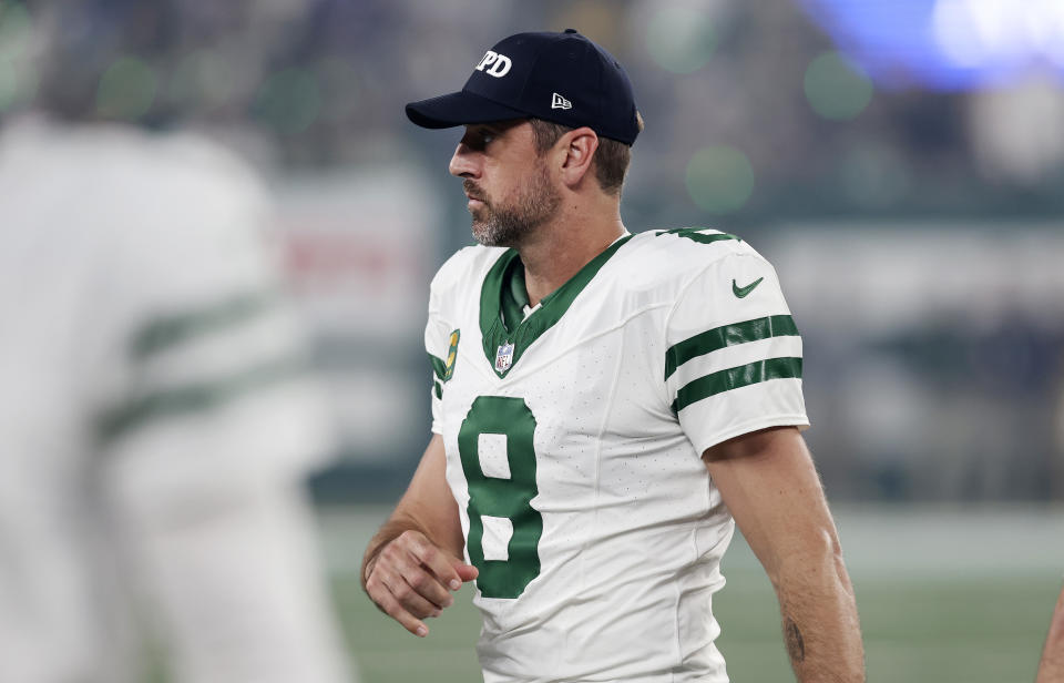 EAST RUTHERFORD, NEW JERSEY - SEPTEMBER 11: (NEW YORK DAILIES OUT)  Aaron Rodgers #8 of the New York Jets looks on before a game against the Buffalo Bills at MetLife Stadium on September 11, 2023 in East Rutherford, New Jersey. The Jets defeated the Bills 22-16 in overtime. (Photo by Jim McIsaac/Getty Images)