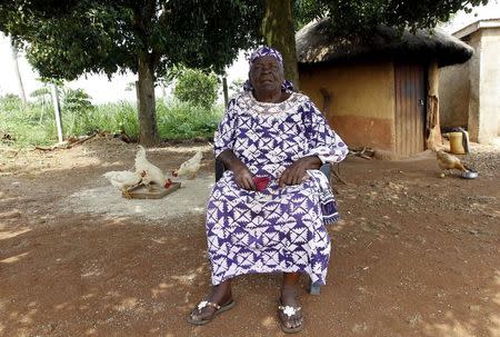 Sarah Hussein Onyango Obama, also known as Mama Sarah, step-grandmother of U.S. President Barack Obama, talks during an interview with Reuters at their ancestral home in Nyangoma village in Kogelo, west of Kenya's capital Nairobi, June 23, 2015. When Barack Obama visits Africa this month, he will be welcomed by a continent that had expected closer attention from a man they claim as their son, a sentiment felt acutely in the Kenyan village where the 44th U.S. president's father is buried. REUTERS/Thomas Mukoya