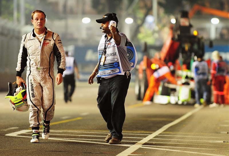 Rubens Barrichello of Brazil and Brawn GP crashes and causes the session to be red flagged during qualifying for the 2009 Singapore Formula One Grand Prix.