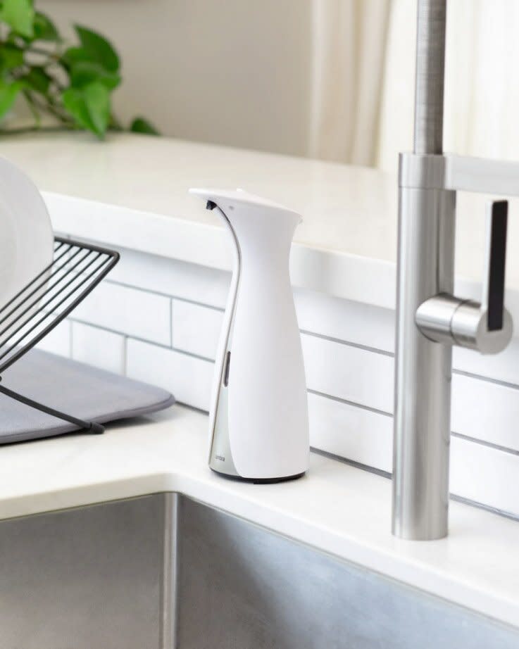 white automatic soap dispenser kitchen sink