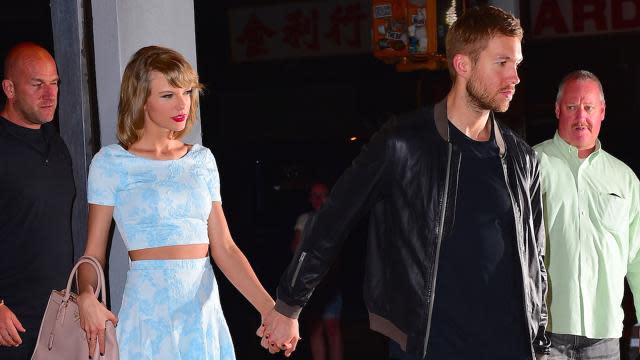 Taylor Swift and Calvin Harris are still going strong! The statuesque couple enjoyed a date night on Tuesday in New York City, going for pizza at L'asso restaurant in Little Italy. The 25-year-old "Bad Blood" singer showed off her slim stomach in a baby blue matching crop top and skirt ensemble by Aqua, and put her long legs on display in sky-high nude stilettos. For his part, Calvin kept it cool in jeans and a black leather jacket, sporting Adidas sneakers. <strong> PHOTOS: All of Taylor Swift's Hot Boyfriends, Past and Present </strong> 247PapsTV Clearly, the pair is still in the honeymoon phase of their relationship. "They were laughing and talking and Calvin was kissing her hand," an eyewitness tells ET about their hour-and-a-half pizza date. The 31-year-old DJ/producer was also spotted going back to Taylor's pad with his luggage, presumably staying at her place for the night. 247PapsTV <strong>WATCH: Taylor Swift and Calvin Harris Make a Hot Couple During Romantic Date Night</strong> Taylor's new beau certainly seems to be the real deal as opposed to a summer romance -- and seriously, when are these two <em>not</em> holding hands? Check out the video below to see Taylor and Calvin showing their favorite type of PDA earlier this month on another romantic date night, this time in Santa Monica, Calif.