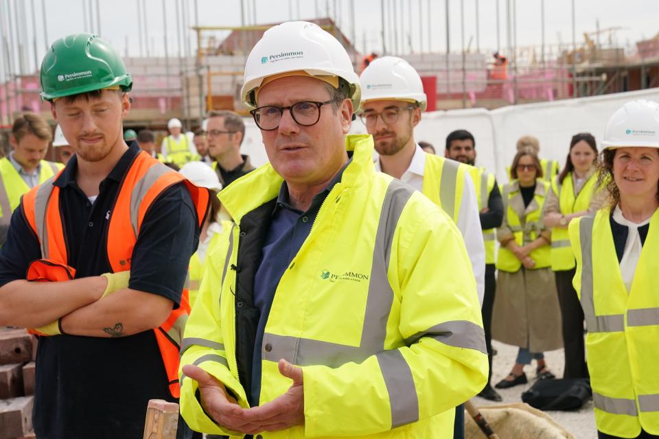 Labour leader Sir Keir Starmer (centre) during a visit to Persimmon Homes Germany Beck in York (PA Wire)