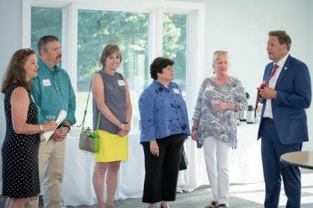 In a reception held at the Elks Lodge in Portsmouth, Governor Chris Sununu and Mayor Deaglan McEachern joined Elks members in presenting a $6,000 Beacon/Spotlight grant to support Portsmouth-based Step Up Parents.