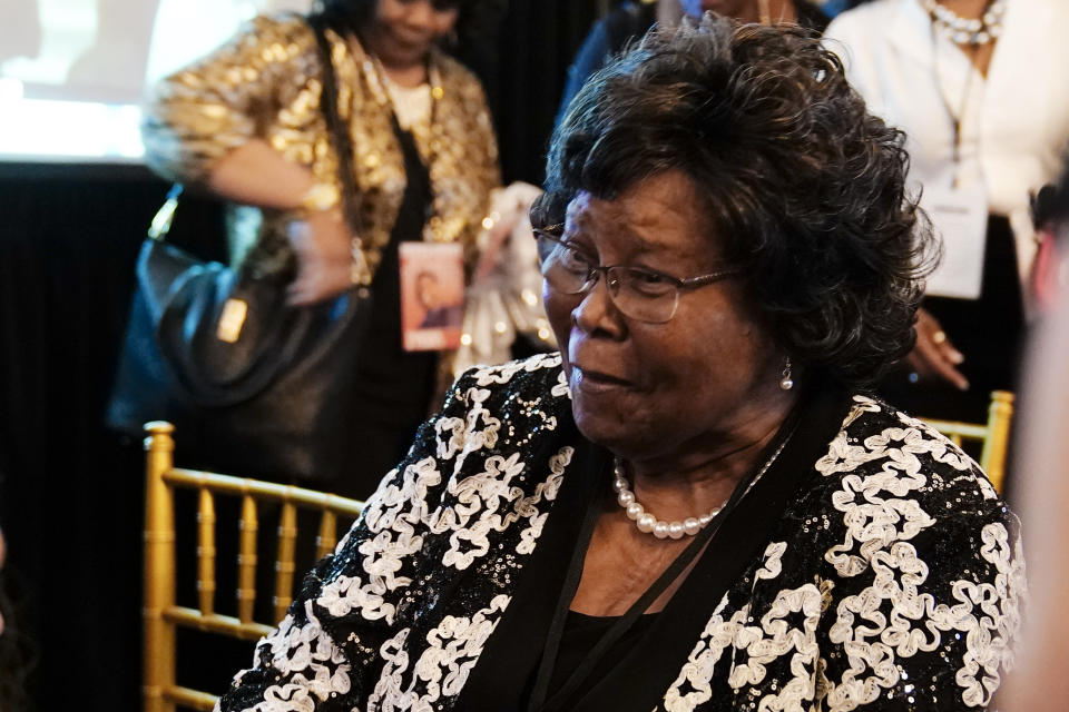 Christine Walker, the mother of U.S. Senate candidate Herschel Walker, speaks to friends during an election night watch party, Tuesday, May 24, 2022, in Atlanta. (AP Photo/Brynn Anderson)